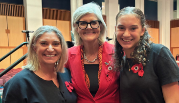 Gwen (left) is pictured with her daughter Emily and the Governor-General, Her Excellency the Honourable Sam Mostyn AC, at the 1000 Voice for Recognition and Remembrance. Emil performed in the OZY Youth Choir