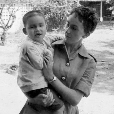 Jan McCarthy whilst serving with a young boy